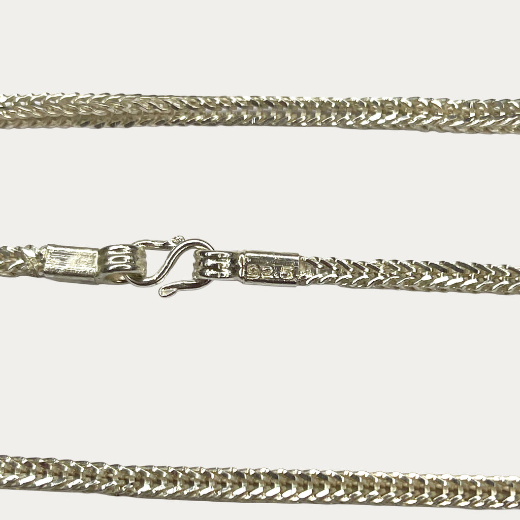 close up of hallmark and clasp of DEXZION Snake Skin Ropenecklace