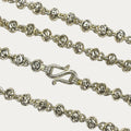 Beaded solid silver necklace with S shaped clasp