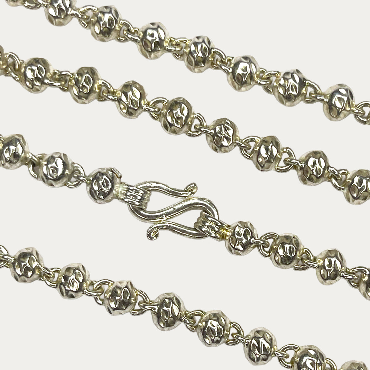 Beaded solid silver necklace with S shaped clasp