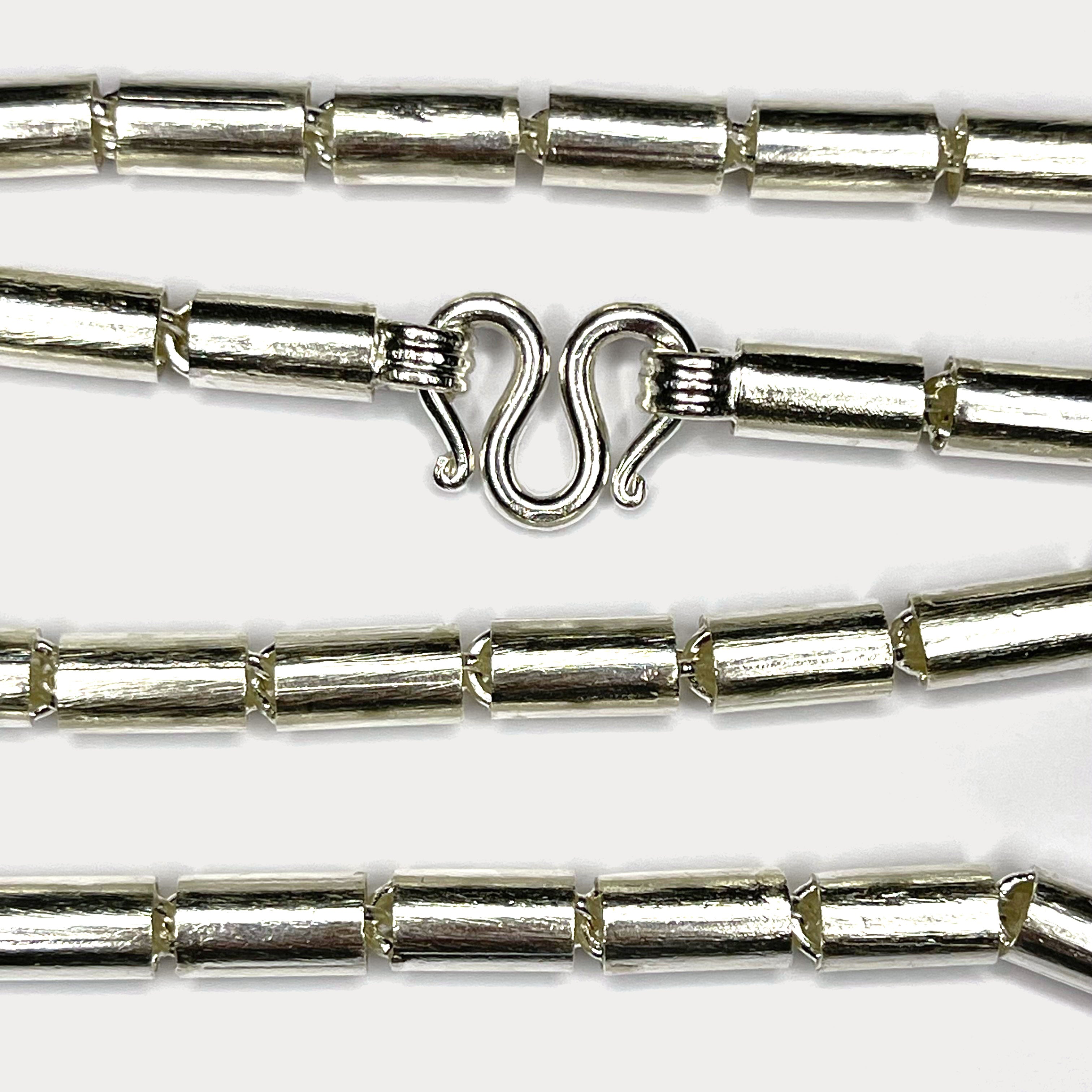 Close up of 100g baht link silver necklace