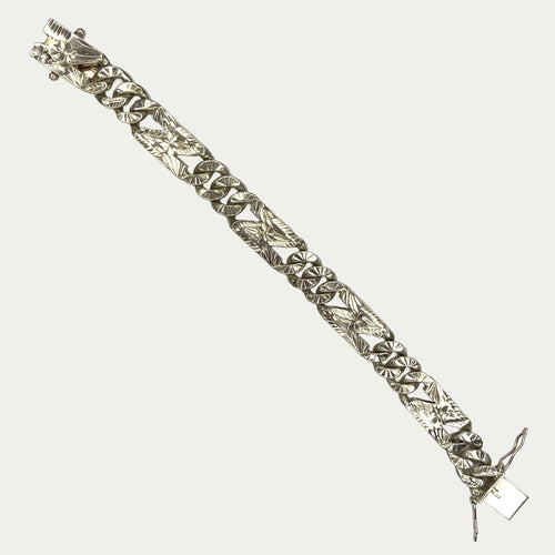 Chunky silver bracelet in Starburst Cuban Link design