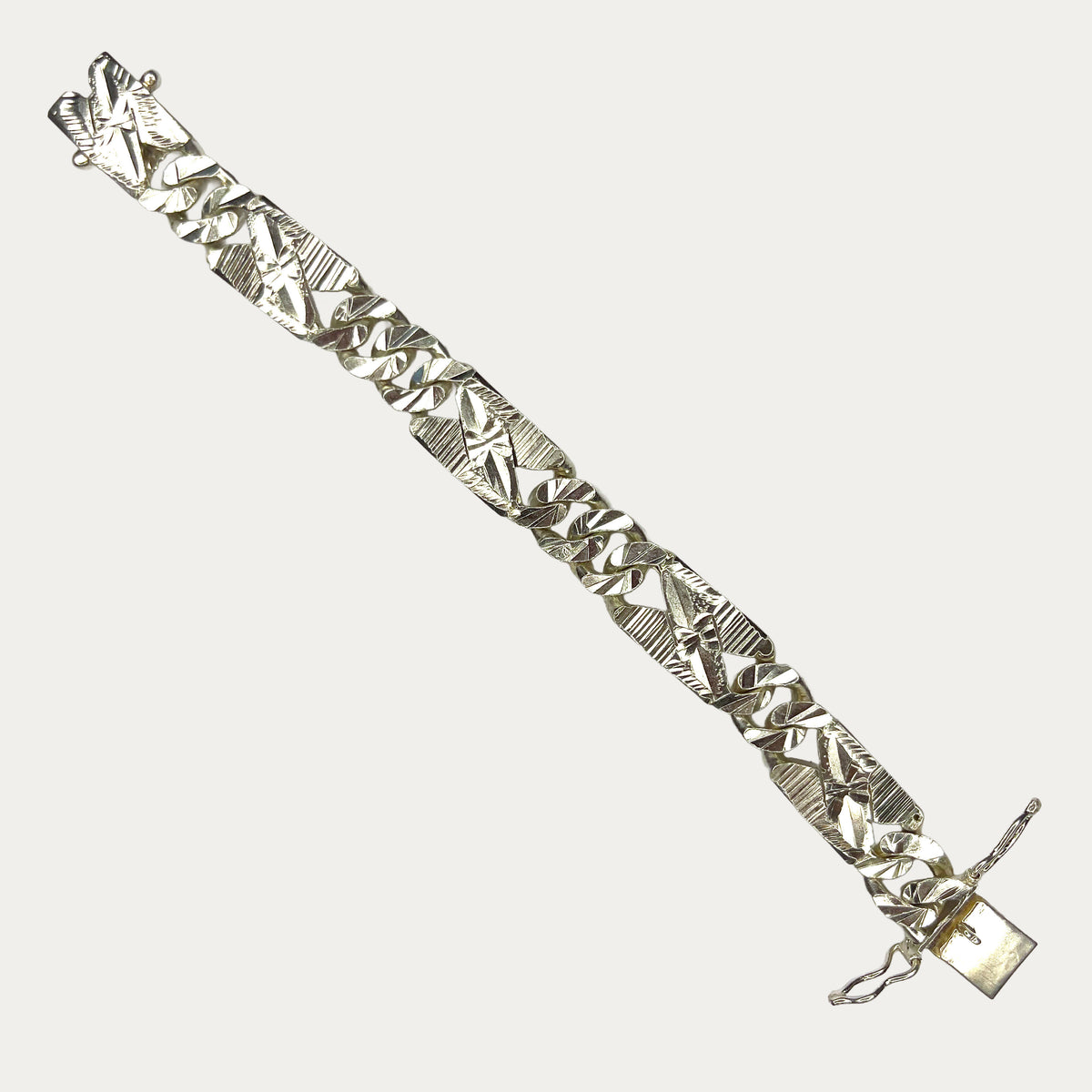 full length view of Diamond Cut Curb Link silver bracelet