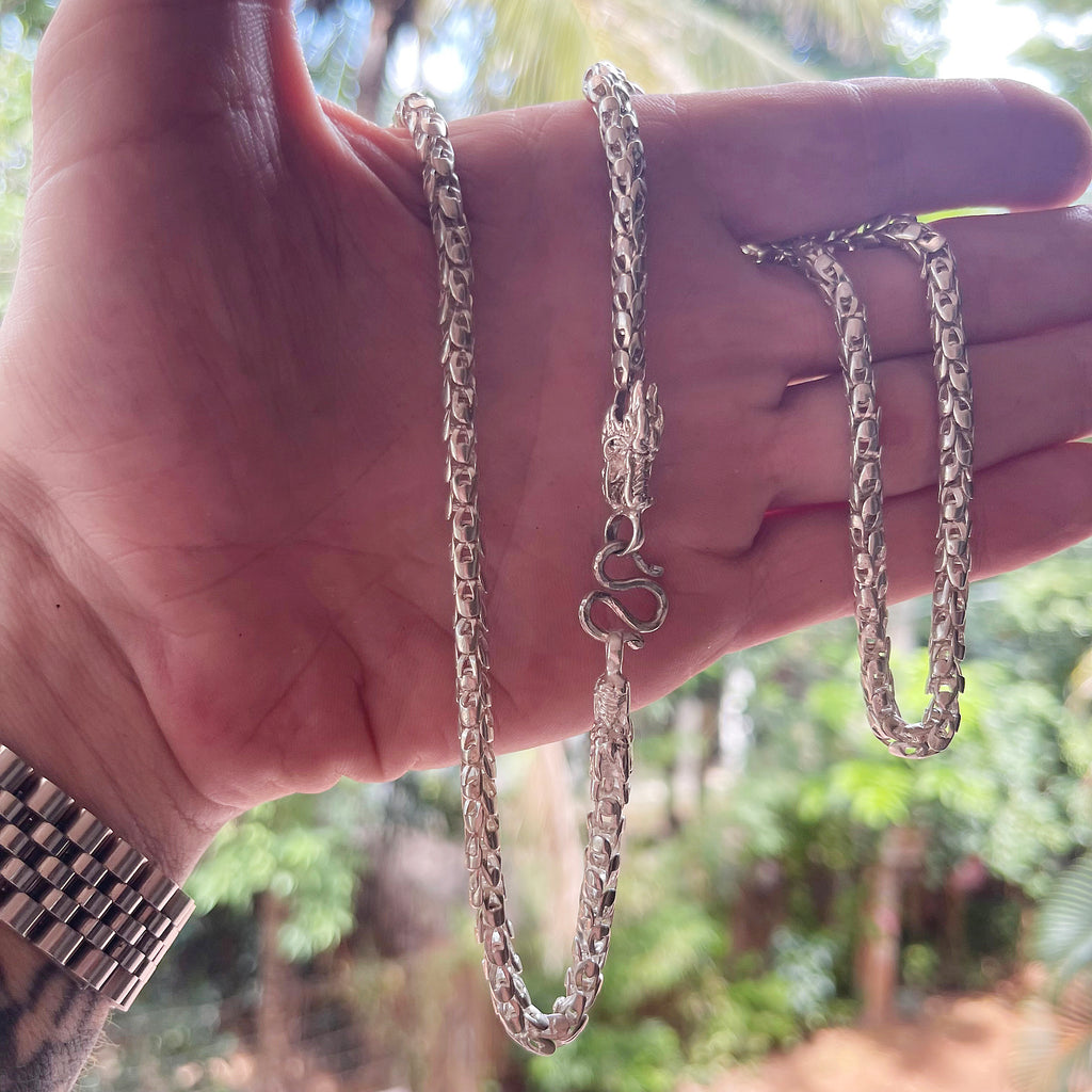 solid silver Dragon Head & Skin chain  held in hand