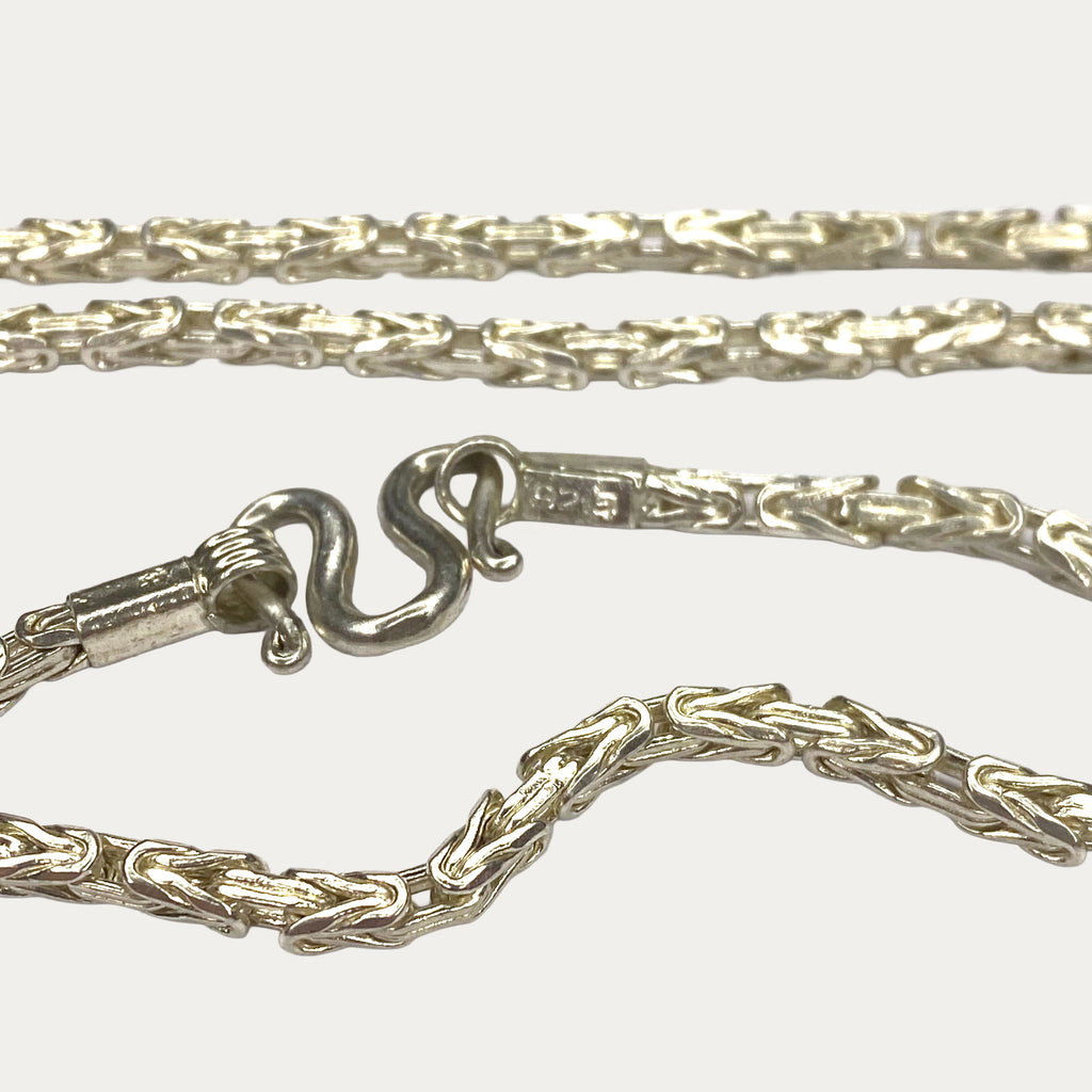Close-up of Solid 999 pure silver DEXZION Byzantine chain 
