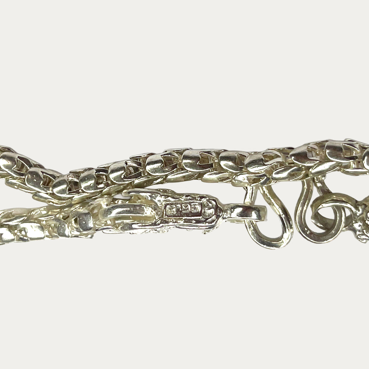 silver Dragon Head & Skin chain close up oh hallmark