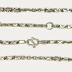Close-up of Triple Bar Khmer Sugarcane link chain in solid silver