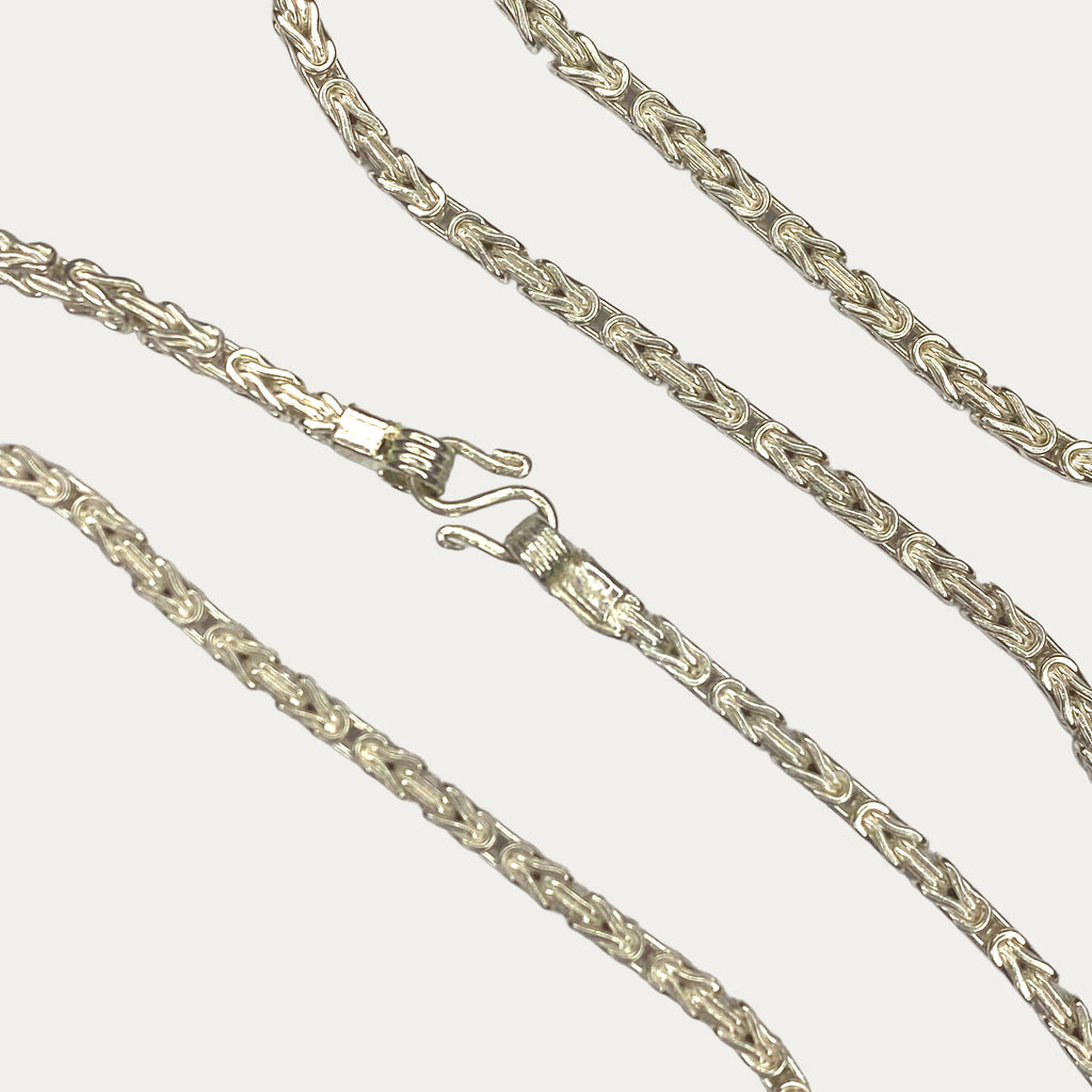 Close-up of solid silver Byzantine chain clasp and links