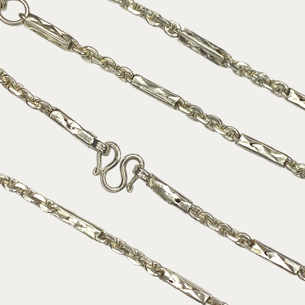 Close-up of solid silver chain clasp and links with 925 sterling