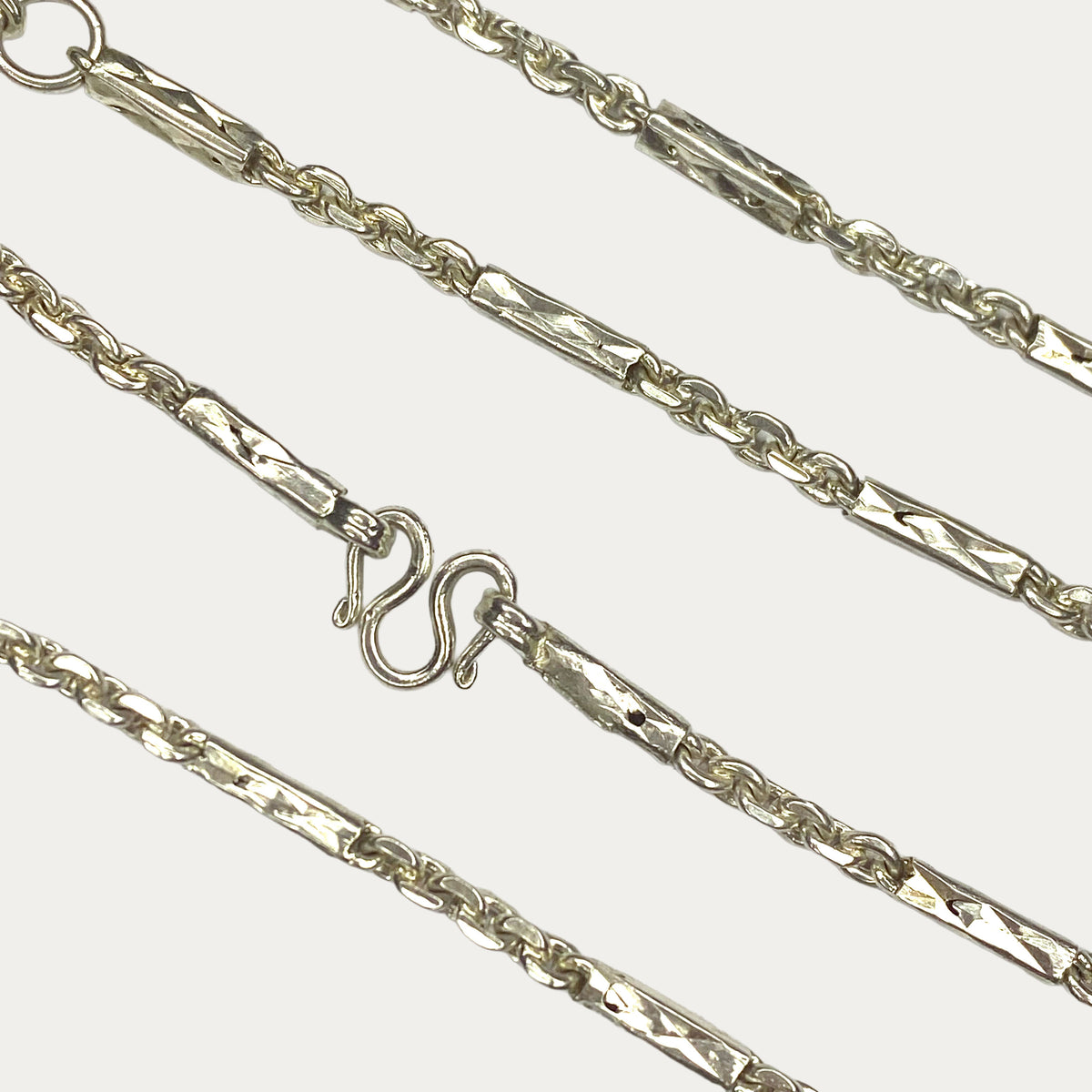 Close-up of solid silver chain clasp and links with 925 sterling